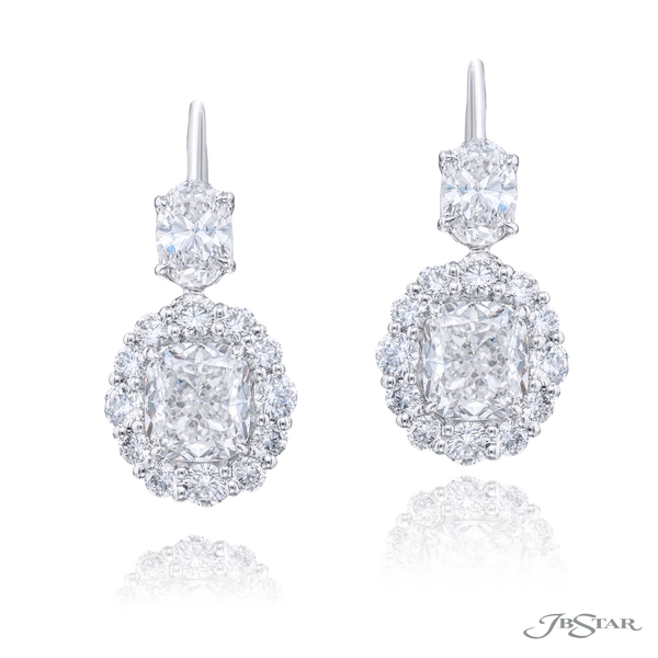 Diamond stud earrings featuring 2 GIA certified cushion-cut diamonds in the center surrounded by round diamonds hung by oval diamonds. 2385-001