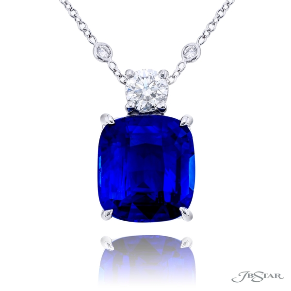 Sapphire pendant featuring a 10.95 CT CDC certified sapphire with round diamond bail. 1199-113