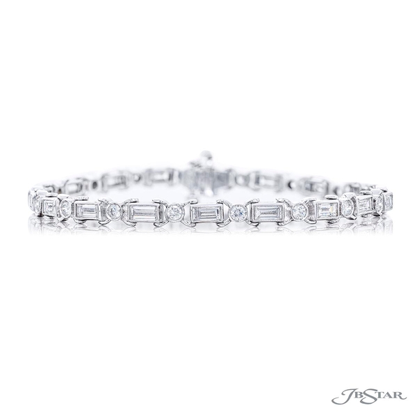 Diamond bracelet featuring straight baguette diamonds linked together by round diamonds in a bezel set. 1710-003