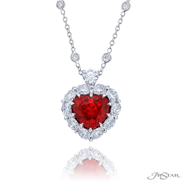 Ruby and diamond pendant featuring a 4.22 ct. heart shape Burma ruby encircled by oval diamonds and hung by one round diamond.1678-002