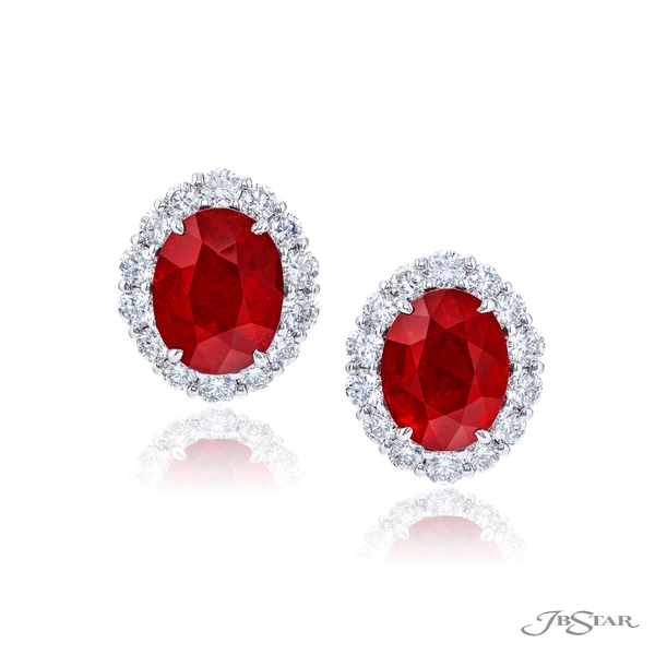 Ruby and diamond stud earrings featuring CDC certified oval Burmese rubies surrounded by round diamonds. 0783-045