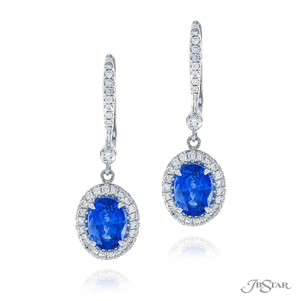 Sapphire and diamond drop earrings featuring oval sapphires encircled by round diamonds. 1539-020
