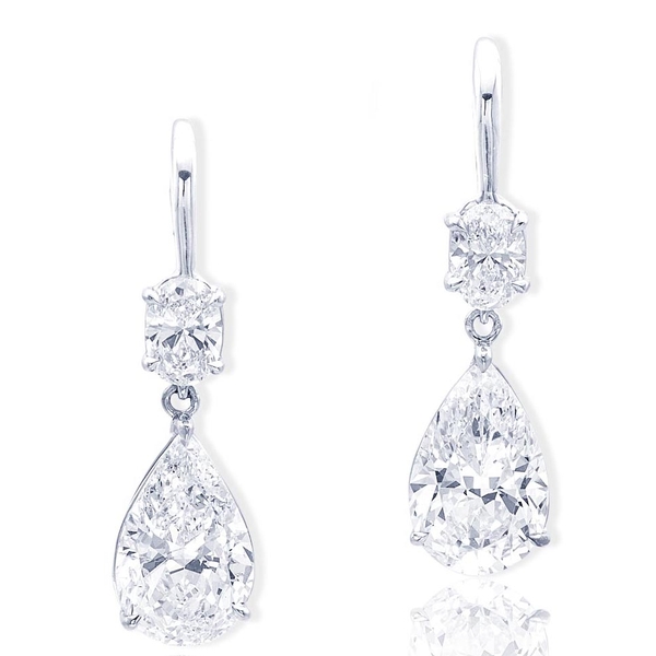 6.11ct. GIA certified pear-shape diamonds hung by oval diamonds.jpg