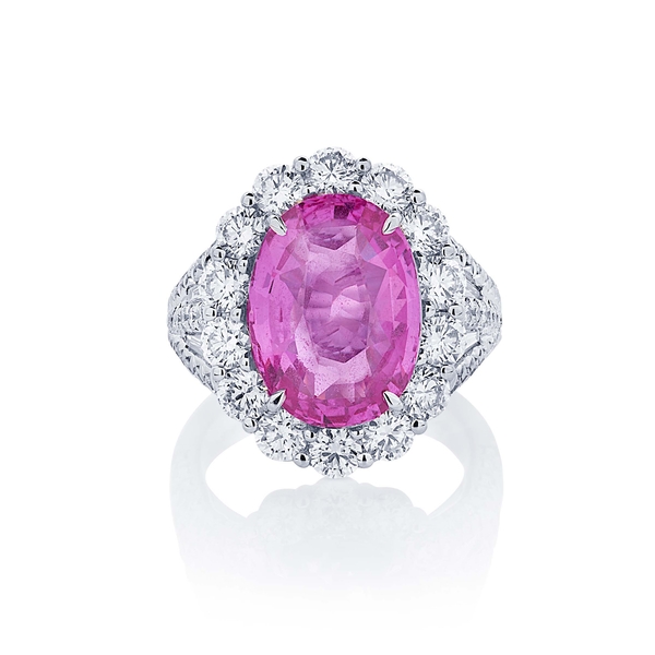 8.13 oval pink sapphire halo diamond ring.jpg