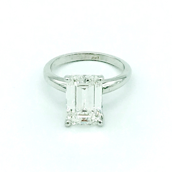 white gold and emerald cut diamond solitiare ring