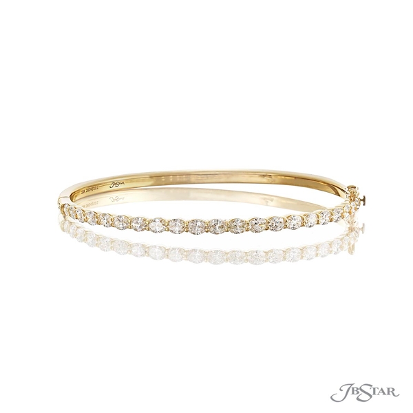 Diamond bangle featuring 21 oval diamonds in a shared prong setting. 3634-001