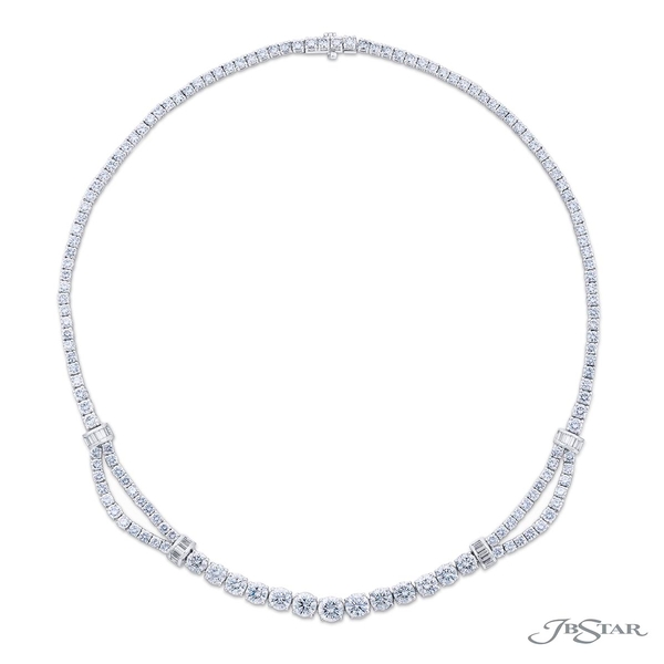 Diamond necklace featuring round diamonds in a shared prong setting. 0701-001