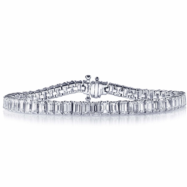 60 beautiful emerald cut diamonds in a shared prong setting. Handcrafted in pure platinum.jpg