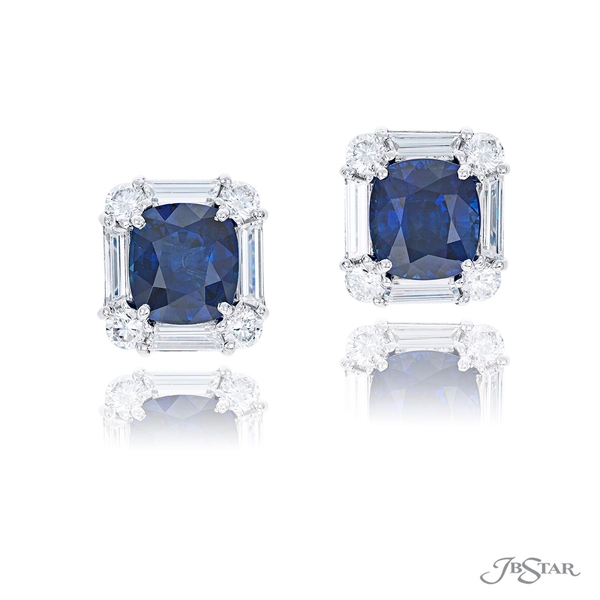 Cushion-cut sapphires embraced by round and trapezoid diamonds. 1621-007