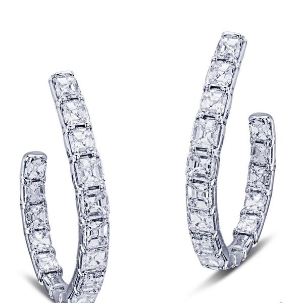 diamond hoop earrings featuring 28 square emerald-cut diamonds.jpg