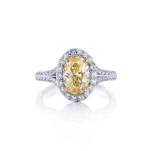 1.59 fancy yellow oval diamond split shank ring.jpg