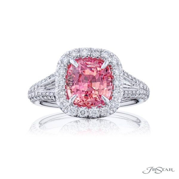Padparadscha and diamond ring featuring an incredible 3.56 ct. cushion-cut padparadscha encased by tapered baguettes and set in a micro pave setting. 5250-077