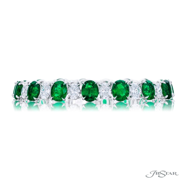 Emerald and diamond bracelet featuring 17 perfectly matched oval emeralds and 17 oval diamonds in prong setting. 099-038