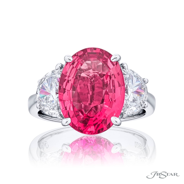 Pink sapphire ring featuring a 5.74 ct. certified pink sapphire oval embraced between half-moon diamonds. 4664-270
