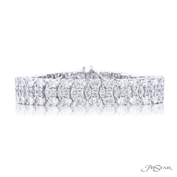 Diamond bracelet featuring marquise and oval diamonds in a beautiful circular design in a shared prong setting. 5823-001