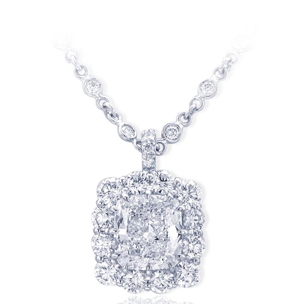 3.51 ct. GIA certified cushion cut diamond encircled by round diamonds in a handcrafted platinum setting.jpg