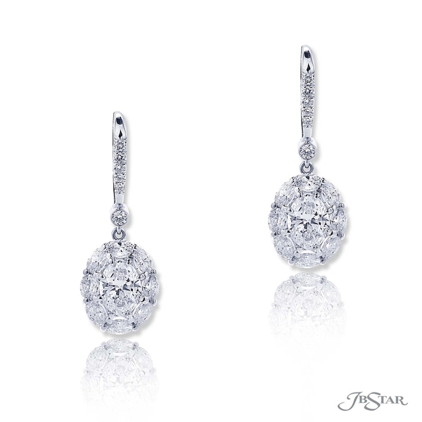 Diamond drop earrings featuring GIA certified oval diamonds at center surrounded by oval diamonds and hung my micro pave. 0779-053