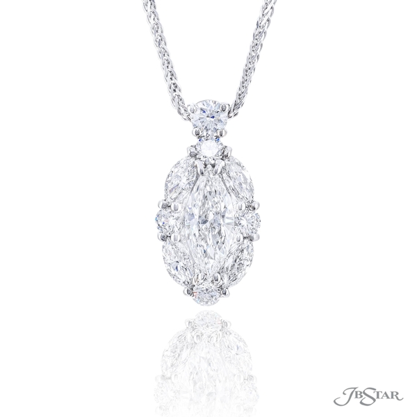 Marquise cut diamond weighing 0.70ct surrounded by a halo of alternating marquise and round diamonds.5836-001