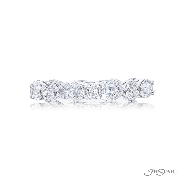 Diamond eternity band featuring 8 round and 8 pear shaped diamonds in a shared prong setting.7238-002