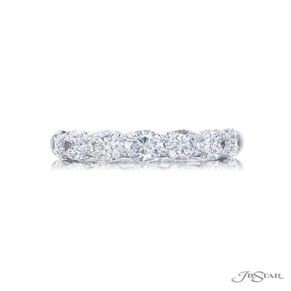 Wedding band featuring 7 oval diamonds in a shared prong setting. 5912-001