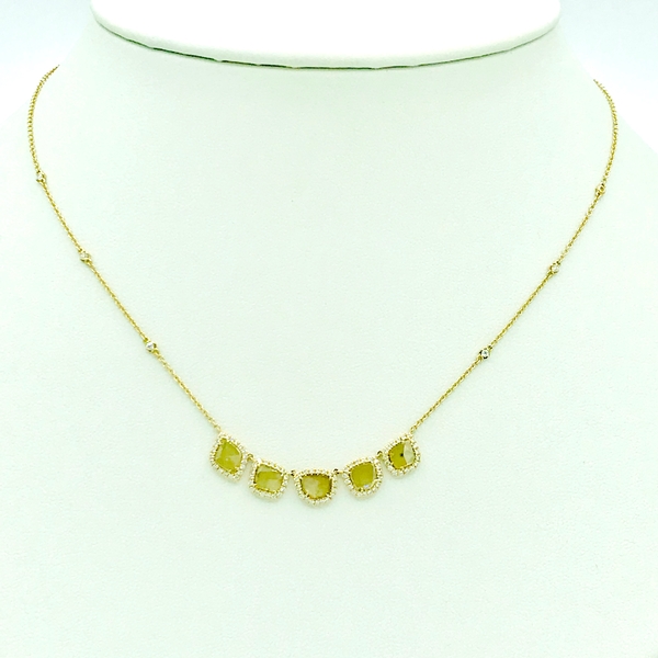 sliced diamond necklace with round cut diamond accents in yellow gold