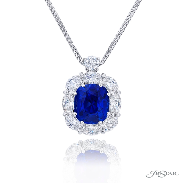 Sapphire and diamond pendant featuring a 5.09 ct. certified cushion cut sapphire embraced by perfectly matched round and oval diamonds. 0779-082