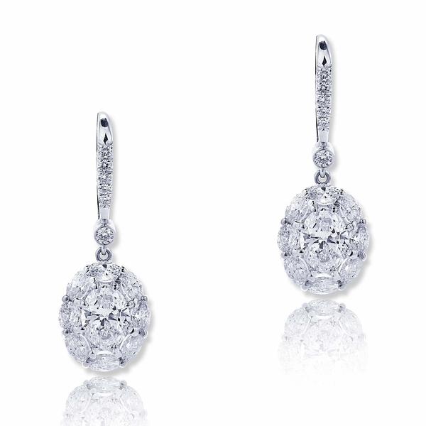 Dazzling diamond drop earrings featuring GIA certified oval diamonds in center surrounded by oval diamonds and hung my micro pave.jpg