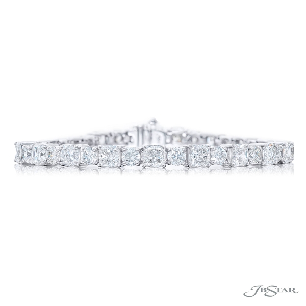 Diamond bracelet featuring 38 perfectly matched round and cushion-cut diamonds in a platinum setting. 7548-001