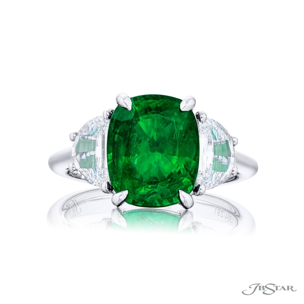 Emerald and diamond ring featuring a 4.25 ct. emerald center embraced by two half moon diamonds.4664-291