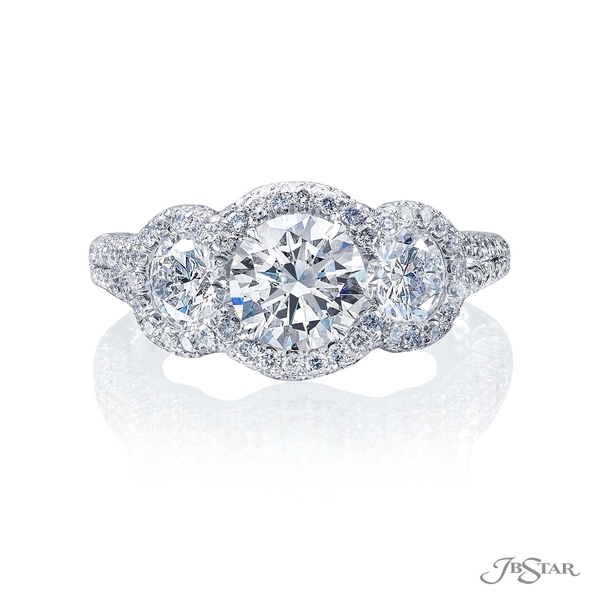 GIA certified round diamond center accompanied by 2 additional round diamonds in a micro pave setting. 0481-007