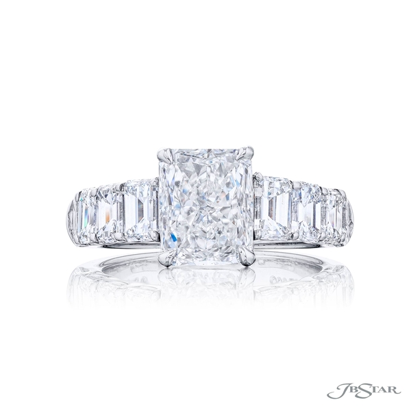 2.72 ct. GIA certified emerald-cut diamond set between graduating emerald-cut diamonds. 2147-007