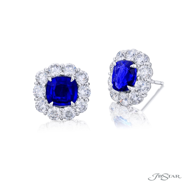 Sapphire stud earrings featuring perfectly matched cushion-cut sapphires centers encircled with round diamonds.0783-010