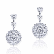 diamond drop earrings featuring round and pear shape diamonds.jpg