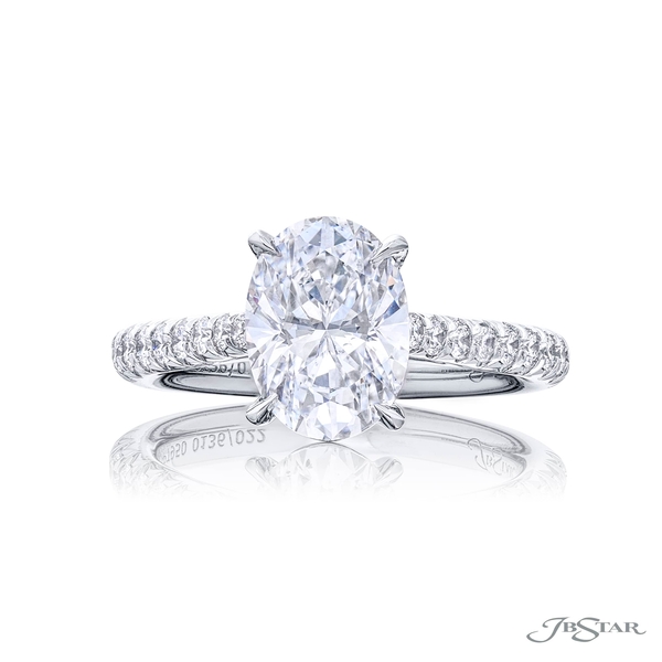 2.43 ct. GIA certified oval diamond center in a micro pave setting. 0136-022-1