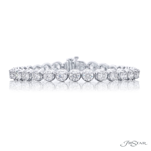 Diamond bracelet featuring 31 prong set round diamonds.1726-003