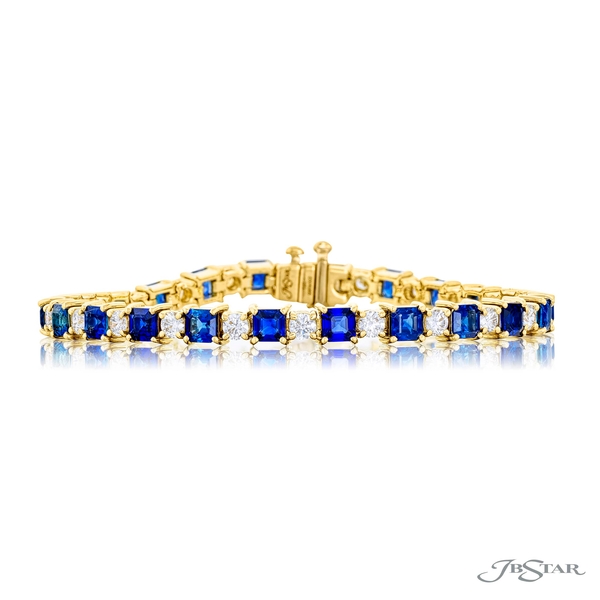 Sapphire and diamond bracelet featuring square emerald-cut sapphires connected with round diamonds. Handcrafted in 18k yellow gold.5989-002
