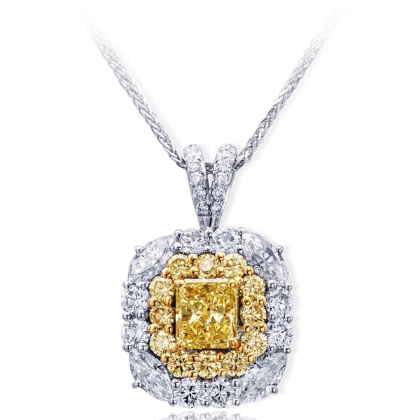 1.23 ct. radiant fancy yellow diamond encircled by round fancy yellow diamond and white marquise and round diamonds. Handcrafted in platinum and 18KY gold.jpg