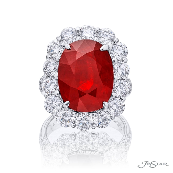 Ruby and diamond ring featuring one 11.80ct Burmese CDC certified oval shape ruby encircled with round diamonds and pave on the shank. 3014-109