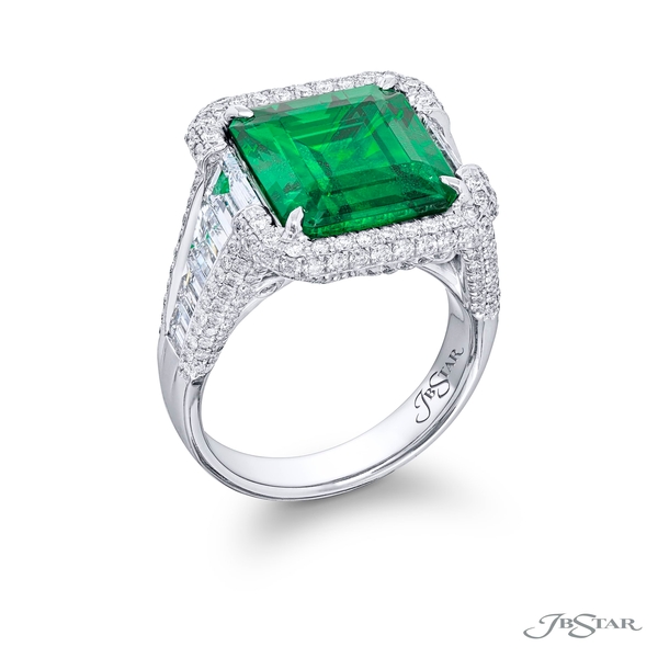 Emerald and diamond ring featuring a certified 7.03 ct. emerald-cut emerald center embraced by trapezoid diamonds in a micro pave setting. 7007-044v2