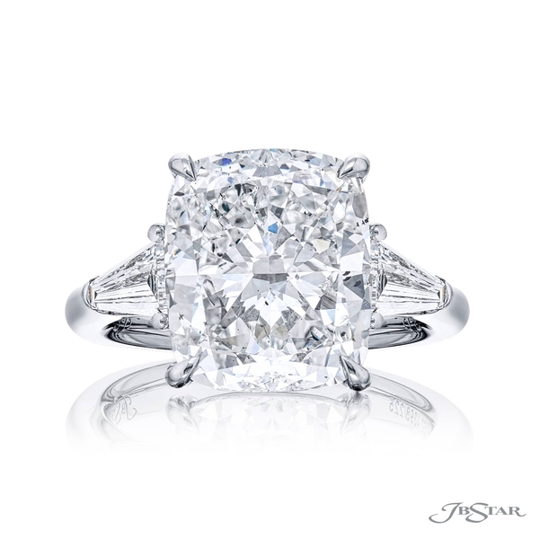 7.21 ct. GIA certified cushion-cut diamond center set between two tapered baguette diamonds. 4398-225