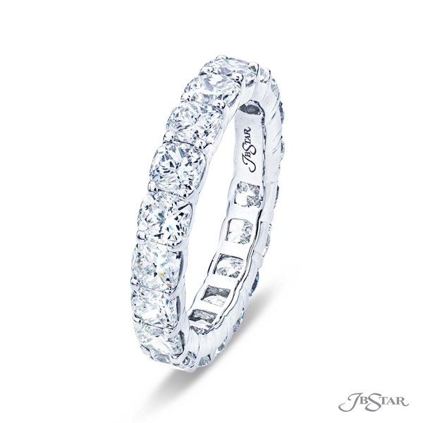Diamond eternity band featuring 19 perfectly matched cushion cut diamonds in a shared prong setting.1912-001v2
