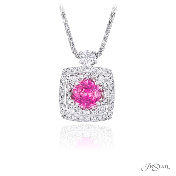 Pink sapphire and diamond pendant featuring a 1.41 ct. round pink sapphire encircled in a micro pave setting.1420-057