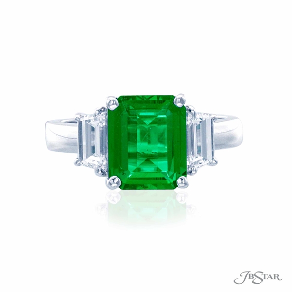 Emerald and diamond ring featuring a 2.08ct emerald-cut emerald embraced by two trapezoid diamonds 0574-035
