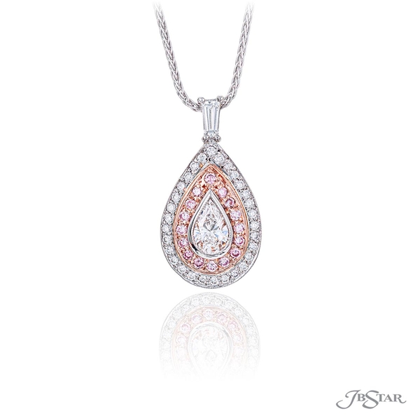 Diamond pendant featuring a 0.54 ct. certified pear shape diamond center surrounded by beautiful round pink and white diamonds.4934-005