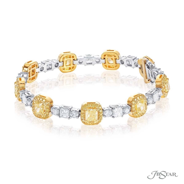 Fancy yellow diamond bracelet featuring fancy yellow radiant cut diamonds surrounded by fancy yellow micro pave and linked together by radiant cut diamonds. 5661-002