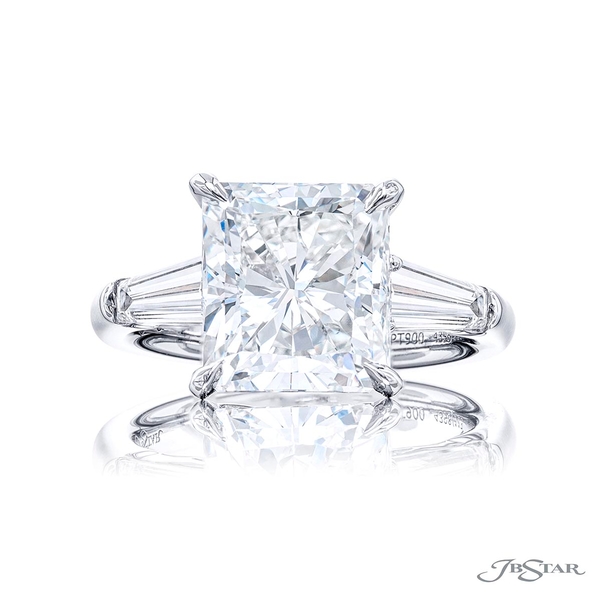 5.02 ct. GIA certified radiant-cut diamond center embraced by two tapered baguette diamonds. 4398-113