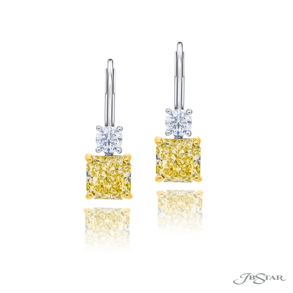 Fancy yellow earrings featuring 2 gorgeous fancy yellow radiant-cut center diamonds with a round diamonds bail. 1199-102