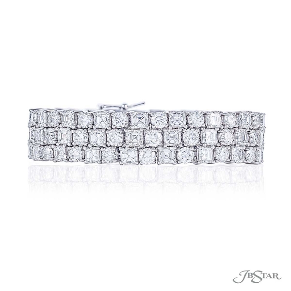 Diamond bracelet featuring 3 rows of square emerald-cut and round diamonds in a shared prong setting 0395-001