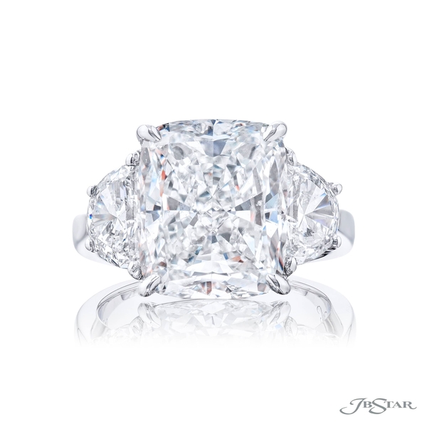 7.03ct GIA certified cushion-cut diamond center set between two half moon diamonds. 4664-270