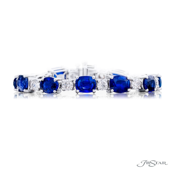 Sapphire and diamond bracelet featuring 12 oval sapphires and 12 brilliant round diamonds in a shared prong setting. 3267-002